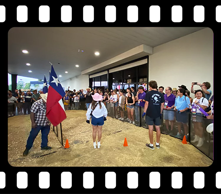 Guests laughing and cheering armadillo races at Imagen Venues Houston