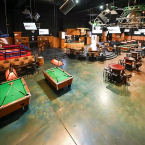 Pool tables area at Stampede inside Imagen Venues corporate event venue in Houston