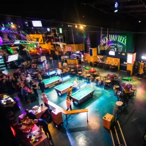 Team building event with pool tables and games at Stampede Event Center in Houston