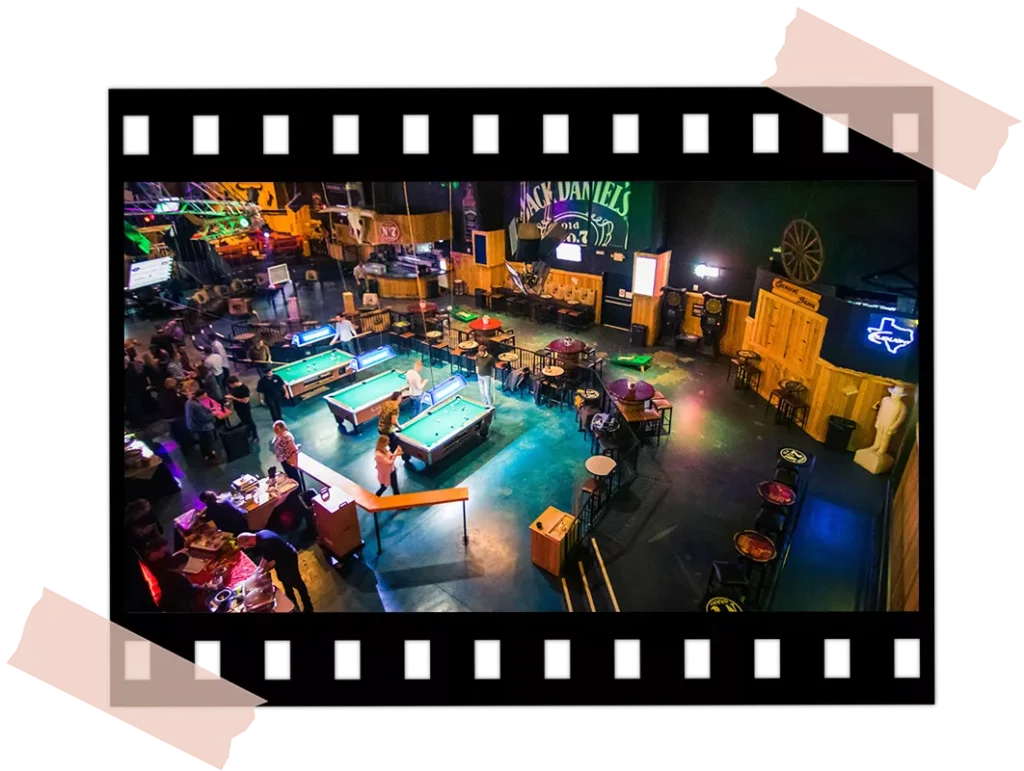 Large entertainment area with multiple pool tables and social seating for corporate events at Imagen Venues Houston